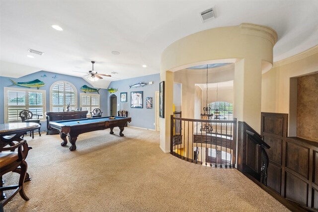 13803 Oak Fair Bnd, Cypress, TX 77429 - recreation room with arched walkways, light carpet, a ceiling fan, healthy amount of natural light, and vaulted ceiling