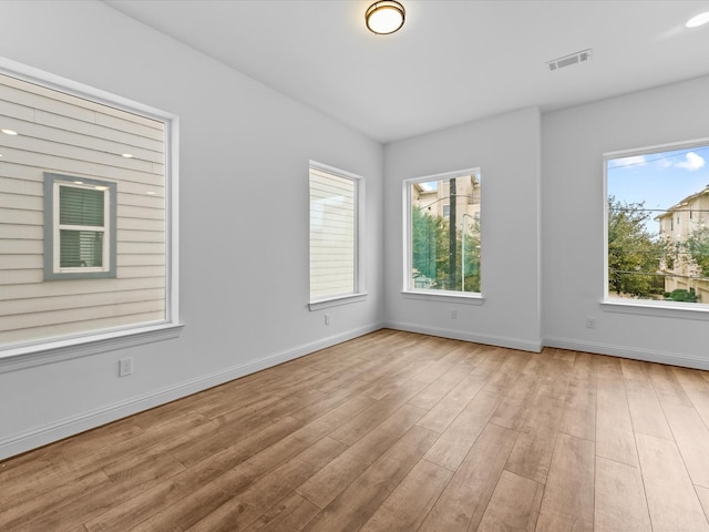 2318 Mcilhenny St, Houston, TX 77004 - unfurnished room featuring wood finished floors and baseboards