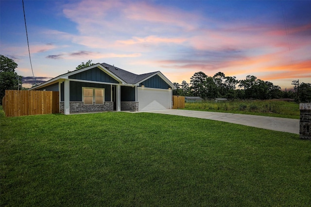 3730 Nathan St, Beaumont, TX 77708 - view of front of property with concrete driveway, board and batten siding, and an attached garage
