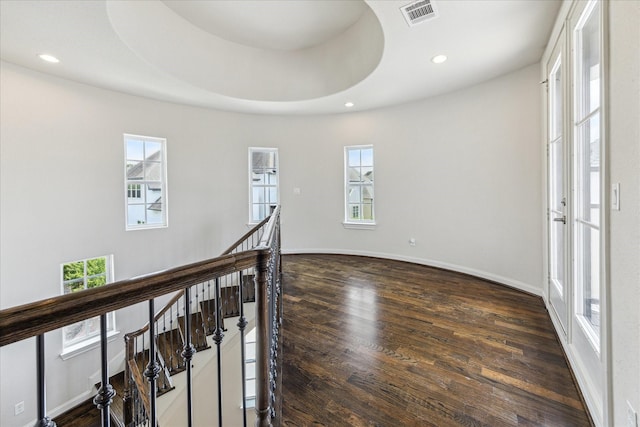 1701 Wrenwood Lks, Houston, TX 77043 - empty room with healthy amount of natural light, dark wood finished floors, recessed lighting, and baseboards