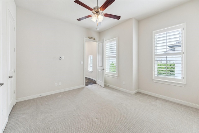 1701 Wrenwood Lks, Houston, TX 77043 - empty room featuring carpet, ceiling fan, and baseboards