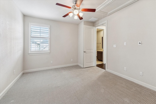 1701 Wrenwood Lks, Houston, TX 77043 - spare room featuring ceiling fan, light carpet, baseboards, and attic access