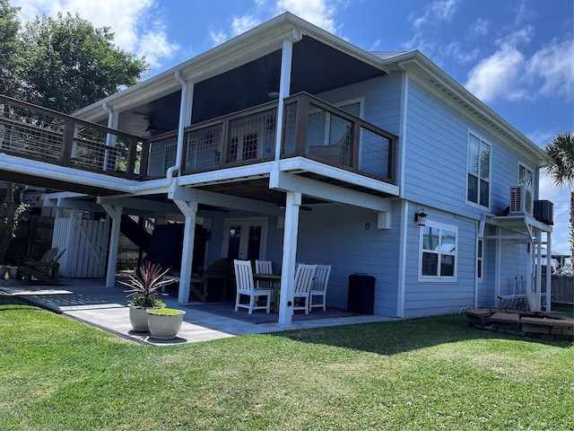 16627 Bermuda Way, Jamaica Beach, TX 77554 - rear view of house with a patio area, a ceiling fan, a balcony, and a sunroom