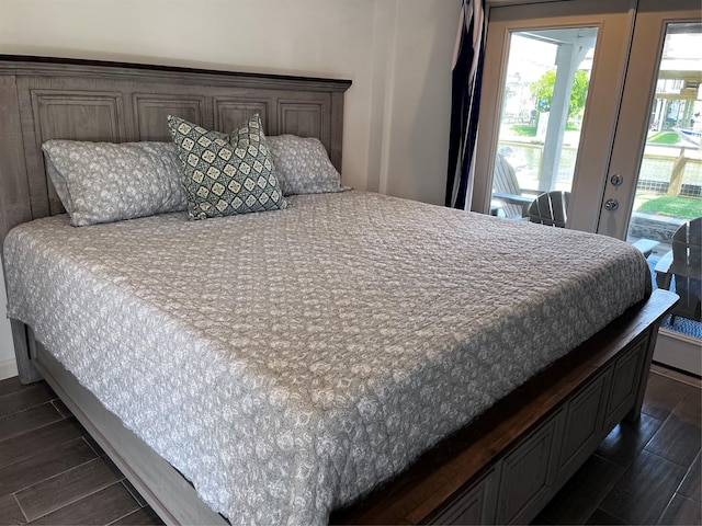 16627 Bermuda Way, Jamaica Beach, TX 77554 - bedroom with wood finish floors, access to outside, and french doors