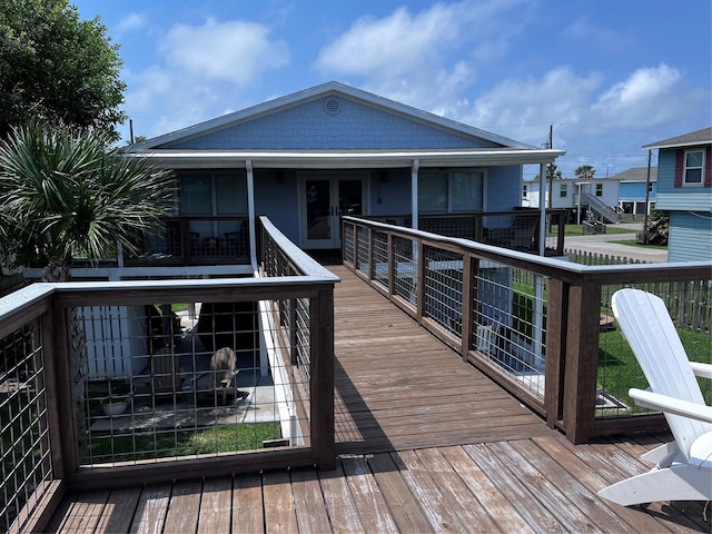 16627 Bermuda Way, Jamaica Beach, TX 77554 - wooden terrace with french doors