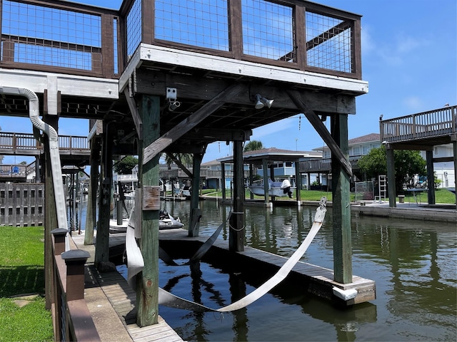 16627 Bermuda Way, Jamaica Beach, TX 77554 - dock featuring a water view and boat lift