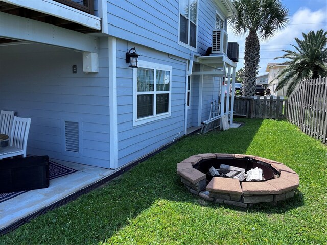 16627 Bermuda Way, Jamaica Beach, TX 77554 - view of yard with a fire pit