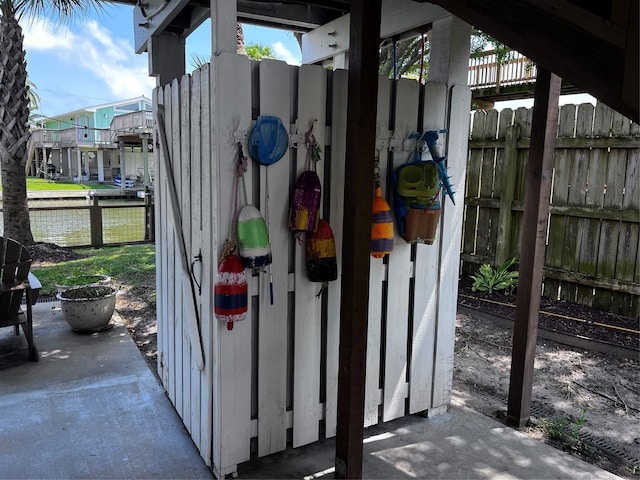16627 Bermuda Way, Jamaica Beach, TX 77554 - view of outbuilding with a water view