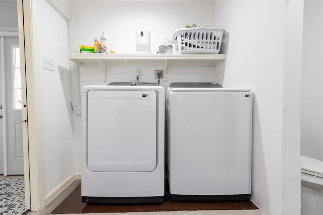 16627 Bermuda Way, Jamaica Beach, TX 77554 - washroom featuring washer and clothes dryer and baseboards