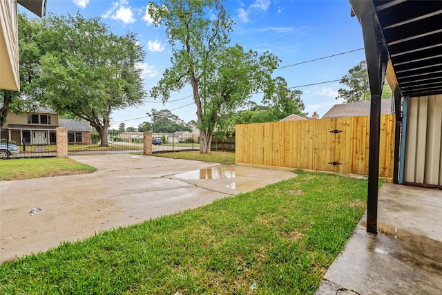 8707 Wind Side Dr, Houston, TX 77040 - view of yard featuring a gate and a patio