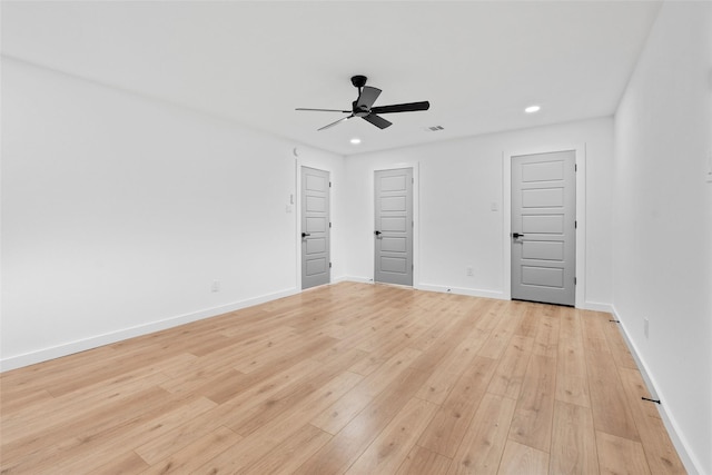 8707 Wind Side Dr, Houston, TX 77040 - unfurnished bedroom with light wood-style floors, recessed lighting, baseboards, and a ceiling fan
