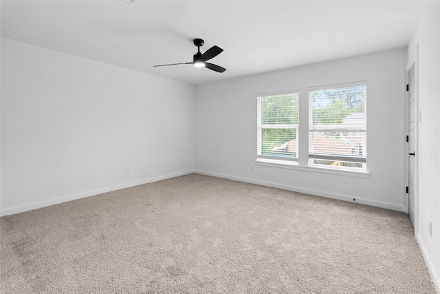 8707 Wind Side Dr, Houston, TX 77040 - carpeted spare room with baseboards and a ceiling fan