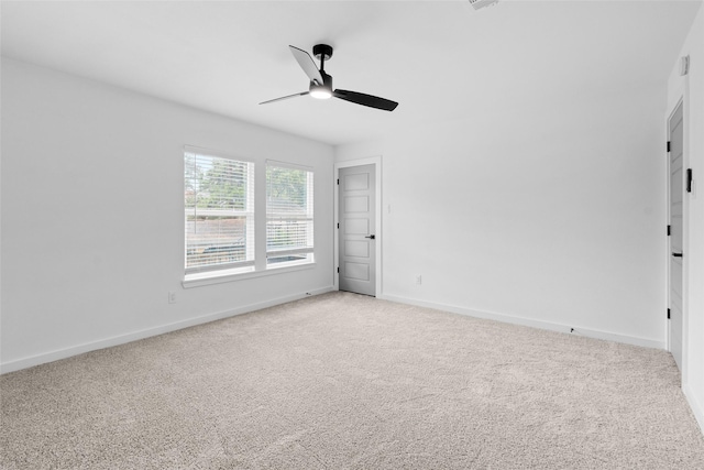 8707 Wind Side Dr, Houston, TX 77040 - unfurnished room featuring ceiling fan, light colored carpet, and baseboards