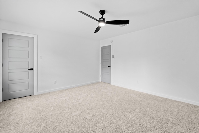 8707 Wind Side Dr, Houston, TX 77040 - spare room featuring ceiling fan, carpet, and baseboards