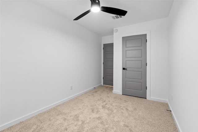 8707 Wind Side Dr, Houston, TX 77040 - unfurnished bedroom with carpet floors, baseboards, and ceiling fan