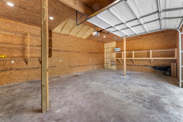 15086 Dewberry Ln, Conroe, TX 77302 - garage featuring recessed lighting and a garage door opener