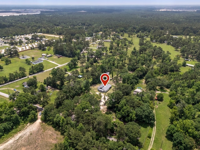 15086 Dewberry Ln, Conroe, TX 77302 - view of property location featuring a heavily wooded area