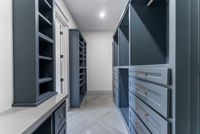 15086 Dewberry Ln, Conroe, TX 77302 - walk in closet with light marble finish floors