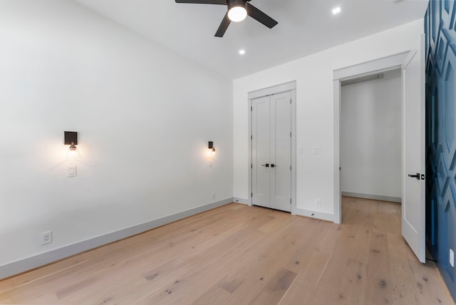 15086 Dewberry Ln, Conroe, TX 77302 - unfurnished bedroom with light wood-type flooring, baseboards, recessed lighting, and ceiling fan