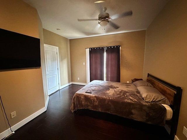1613 Bonner St, Houston, TX 77007 - bedroom featuring baseboards, dark wood-style flooring, and a ceiling fan