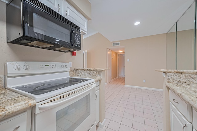 2110 Wilcrest Dr Unit 236, Houston, TX 77042 - kitchen with white electric stove, black microwave, light tile patterned floors, and white cabinets