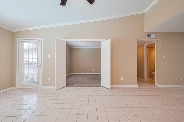 2110 Wilcrest Dr Unit 236, Houston, TX 77042 - empty room with crown molding, baseboards, ceiling fan, and light tile patterned floors