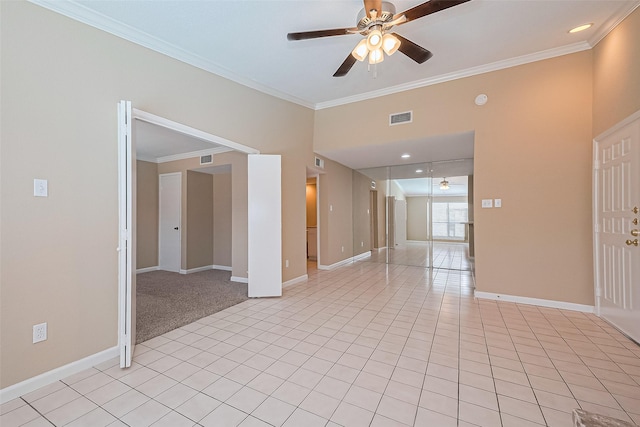 2110 Wilcrest Dr Unit 236, Houston, TX 77042 - unfurnished room featuring a ceiling fan, ornamental molding, baseboards, and light tile patterned floors