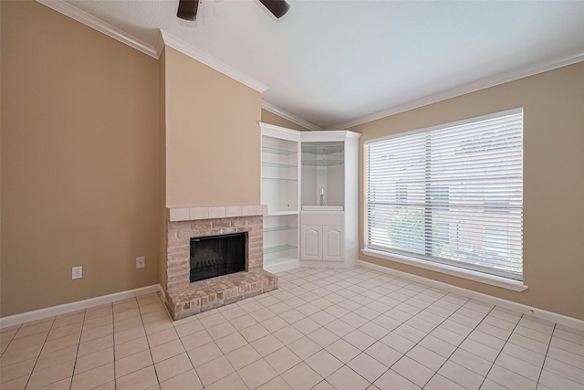 2110 Wilcrest Dr Unit 236, Houston, TX 77042 - unfurnished living room featuring baseboards, light tile patterned floors, crown molding, ceiling fan, and a brick fireplace