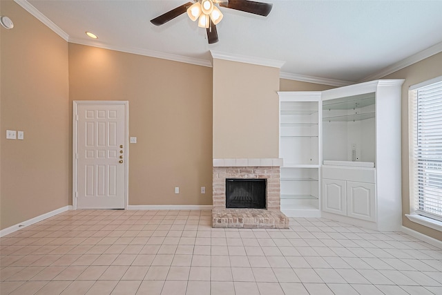 2110 Wilcrest Dr Unit 236, Houston, TX 77042 - unfurnished living room featuring ceiling fan, baseboards, light tile patterned flooring, a fireplace, and ornamental molding