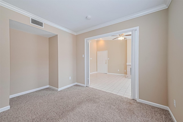 2110 Wilcrest Dr Unit 236, Houston, TX 77042 - unfurnished room featuring crown molding, light colored carpet, a smoke detector, ceiling fan, and baseboards