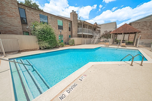 2110 Wilcrest Dr Unit 236, Houston, TX 77042 - community pool with a gazebo, stairs, and central AC