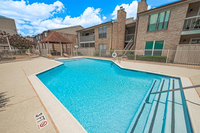 2110 Wilcrest Dr Unit 236, Houston, TX 77042 - community pool with a gazebo and a patio