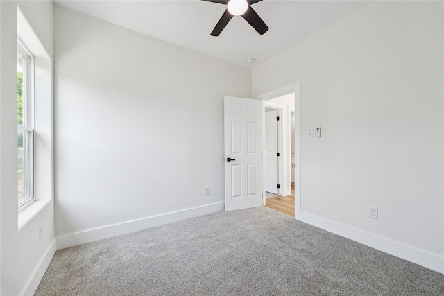 3700 Avenue S, Santa Fe, TX 77510 - empty room with light colored carpet, ceiling fan, and baseboards