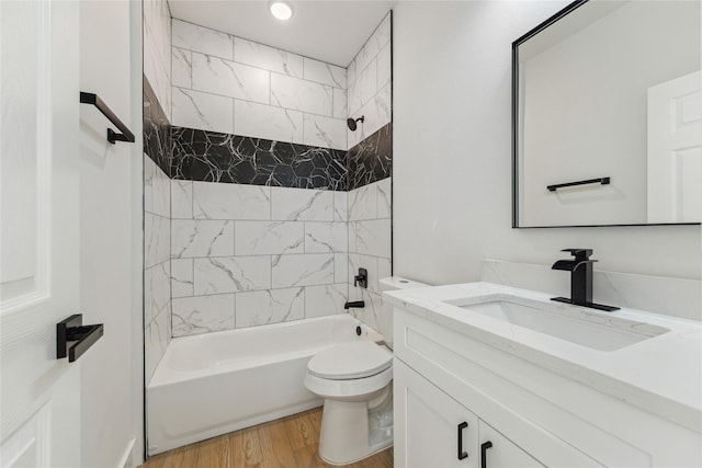 3700 Avenue S, Santa Fe, TX 77510 - bathroom with vanity, wood finished floors, toilet,  shower combination, and recessed lighting