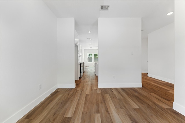 3700 Avenue S, Santa Fe, TX 77510 - unfurnished room featuring light wood finished floors, baseboards, and recessed lighting