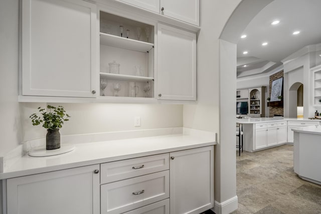 12911 Mossy Shr, Tomball, TX 77375 - bar area featuring arched walkways and recessed lighting