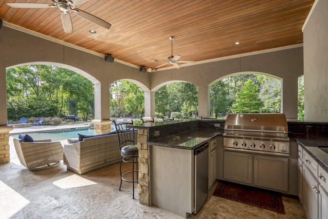 12911 Mossy Shr, Tomball, TX 77375 - view of patio featuring ceiling fan, view of scattered trees, and an outdoor pool