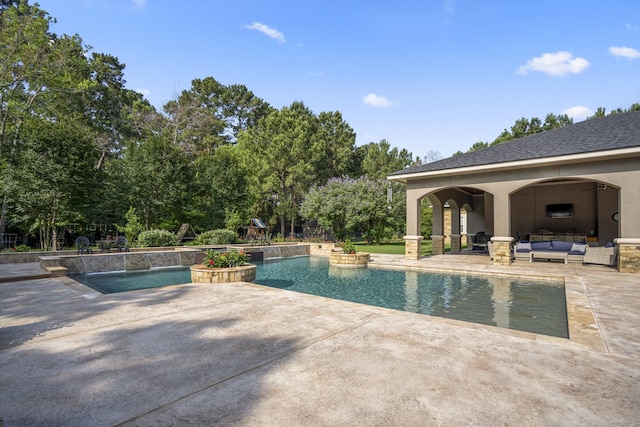 12911 Mossy Shr, Tomball, TX 77375 - outdoor pool featuring an outdoor hangout area, a patio area, and view of wooded area