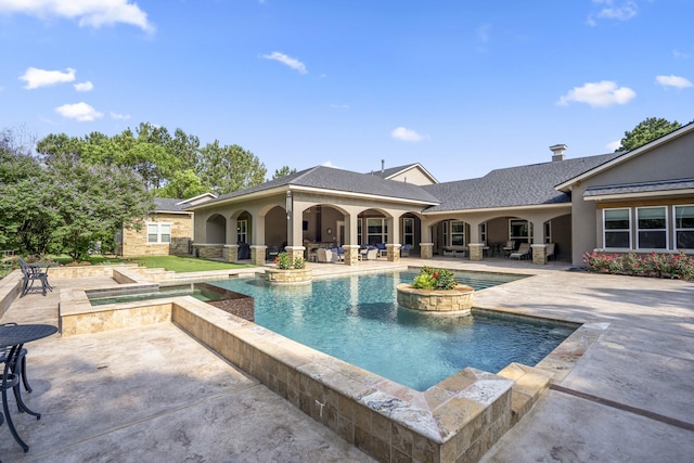 12911 Mossy Shr, Tomball, TX 77375 - view of swimming pool featuring an outdoor living space, a patio, and a pool with connected hot tub