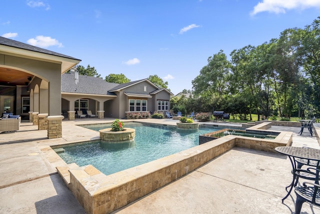12911 Mossy Shr, Tomball, TX 77375 - swimming pool with an in-ground hot tub, a patio area, and grilling area