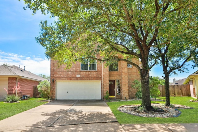 19710 Ringwald Ct, Spring, TX 77379 - traditional home with driveway, a garage, and brick siding