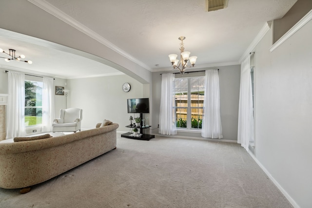 19710 Ringwald Ct, Spring, TX 77379 - carpeted living area featuring a chandelier, arched walkways, baseboards, and ornamental molding