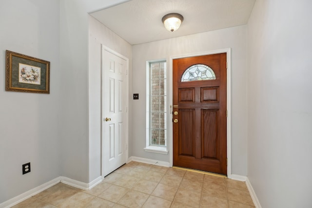 19710 Ringwald Ct, Spring, TX 77379 - entrance foyer with baseboards and light tile patterned floors