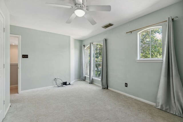 19710 Ringwald Ct, Spring, TX 77379 - carpeted spare room with plenty of natural light, ceiling fan, and baseboards