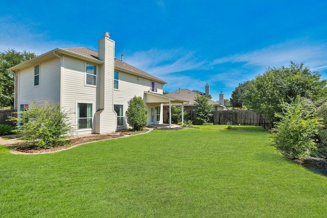 19710 Ringwald Ct, Spring, TX 77379 - back of house featuring a chimney and roof with shingles