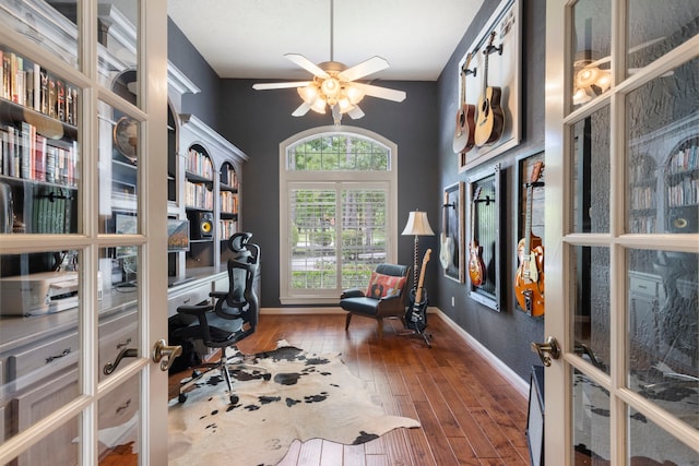 63 N Wooded Brook Cir, The Woodlands, TX 77382 - office area with wood-type flooring, ceiling fan, and baseboards