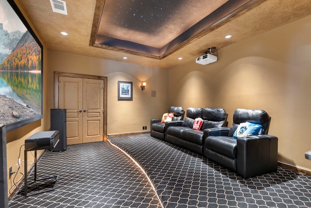 63 N Wooded Brook Cir, The Woodlands, TX 77382 - cinema featuring carpet flooring, baseboards, recessed lighting, and a raised ceiling