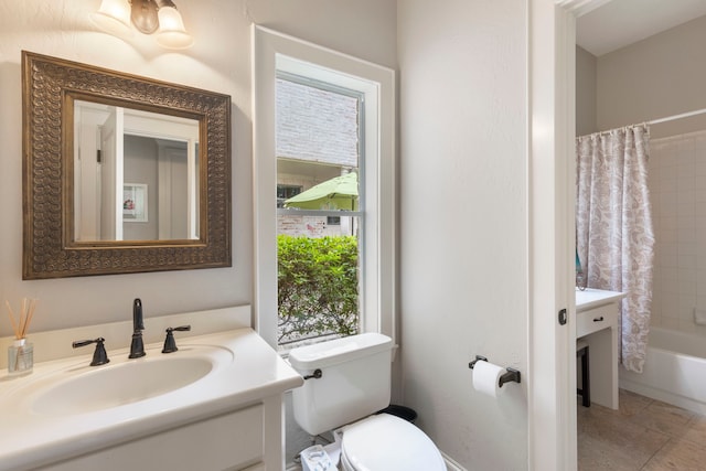 63 N Wooded Brook Cir, The Woodlands, TX 77382 - bathroom with vanity, toilet, shower / tub combo with curtain, and tile patterned floors