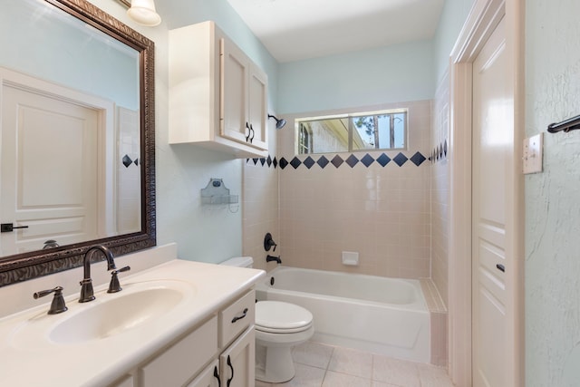 63 N Wooded Brook Cir, The Woodlands, TX 77382 - bathroom with toilet, vanity, tub / shower combination, tile patterned floors, and a textured wall
