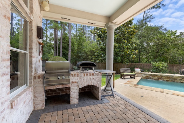 63 N Wooded Brook Cir, The Woodlands, TX 77382 - fenced backyard featuring a patio and view of scattered trees